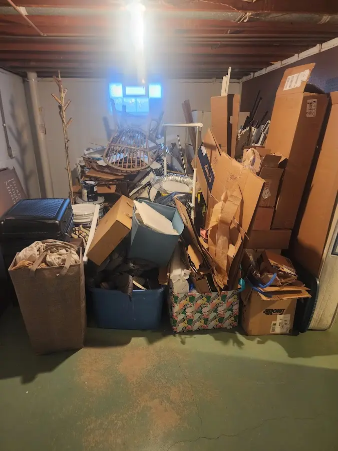 Roll-off dumpster container at job site for 2 Yard Dumpster Rental in Grandview